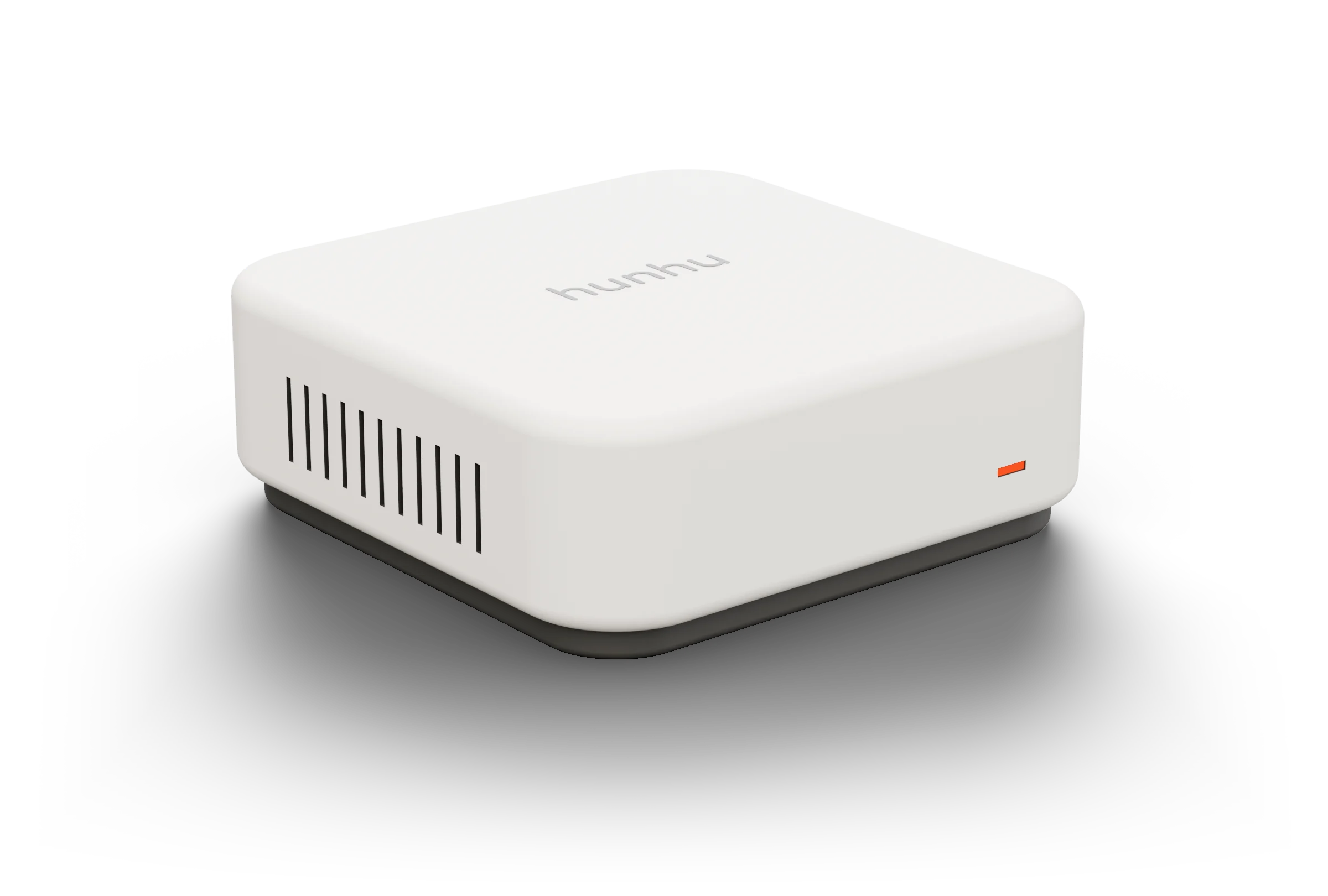 The hunhu box: a small, square white box with soft corners, one orange light on its front and the word hunhu pressed into its lid.